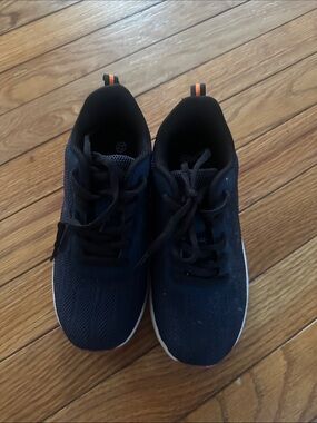 Nike Kids Navy Blue and Black Sneakers with Orange Heel Tabs